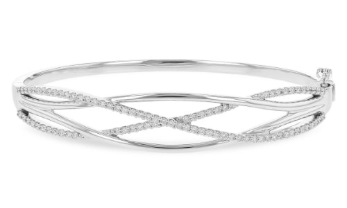 A white gold bangle with interweaving strands