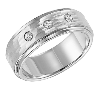 Cobalt and diamond men’s wedding band with bezel setting by Triton