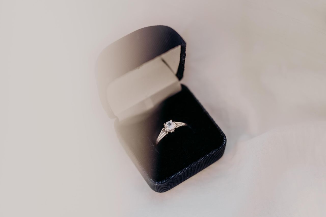 Diamond engagement ring in a black jewelry box