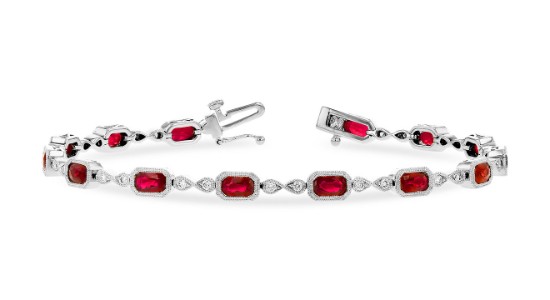 a white gold line bracelet featuring rubies and diamonds