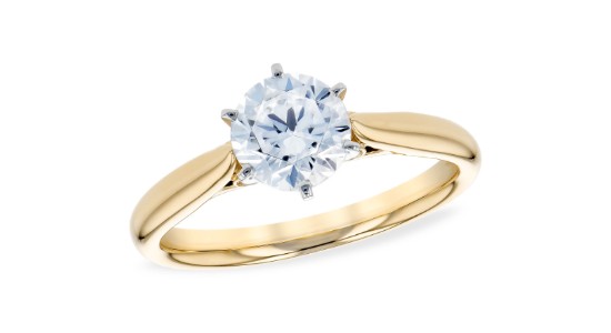 A yellow gold solitaire engagement ring from Allison-Kaufman, available at Pucci’s Jewelers.