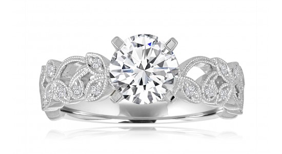 A white gold engagement ring with vine and milgrain details, available at Pucci’s Jewelers.